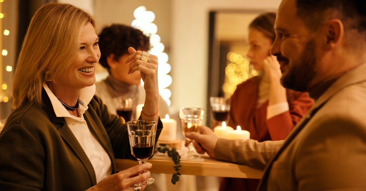 Do I need to talk to everyone everytime that there's a festival? - Man and Woman Happily Talking to Each Other Do I need to talk to everyone everytime that there's a festival? - Man and Woman Happily Talking to Each Other