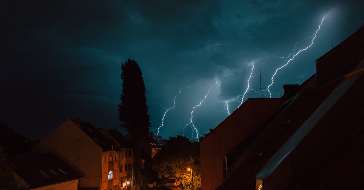 Do lightning spell damage bombs? - Lightning over Brown Concrete Building during Night Time