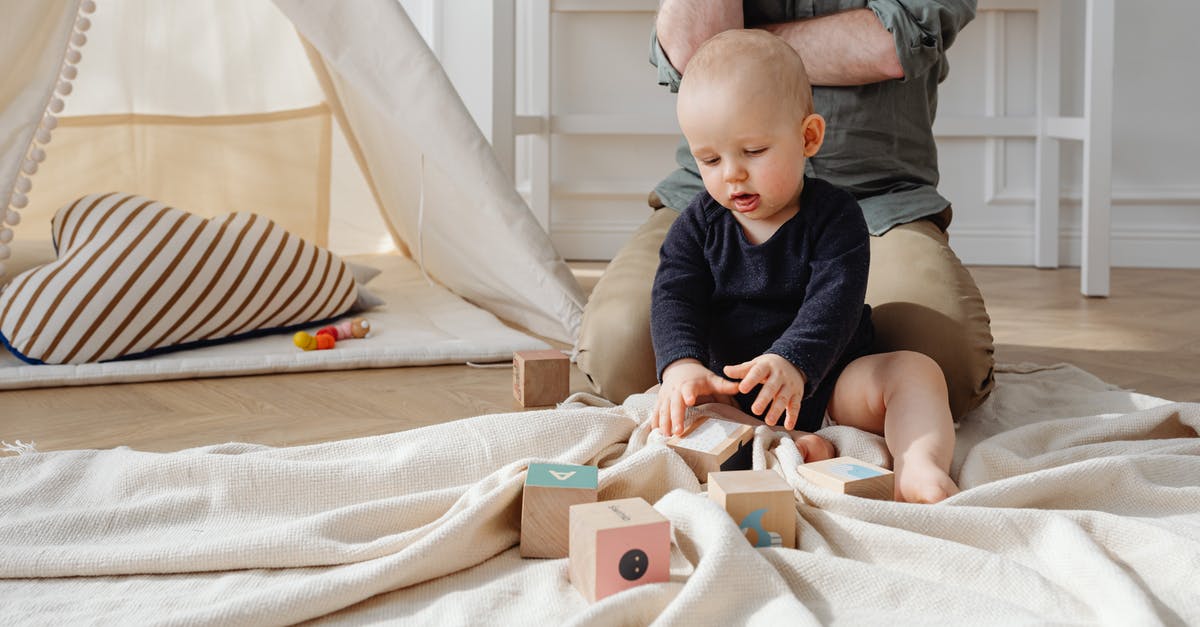 Do Mobs spawn on Magma Blocks? - Man in Gray Long Sleeve Shirt Holding Baby in Blue Onesie Do Mobs spawn on Magma Blocks? - Man in Gray Long Sleeve Shirt Holding Baby in Blue Onesie