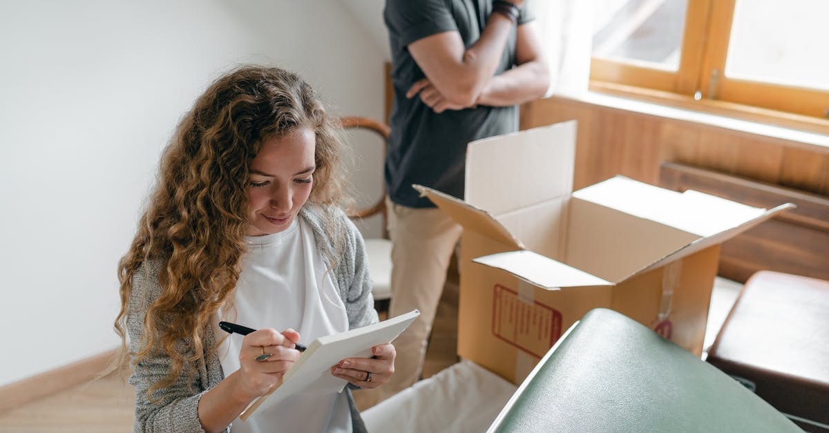 Do moves or Pokemon types count towards strengths or weaknesses? - Pensive couple taking notes in bedroom near window while packing stuff in carton box to move into new apartment