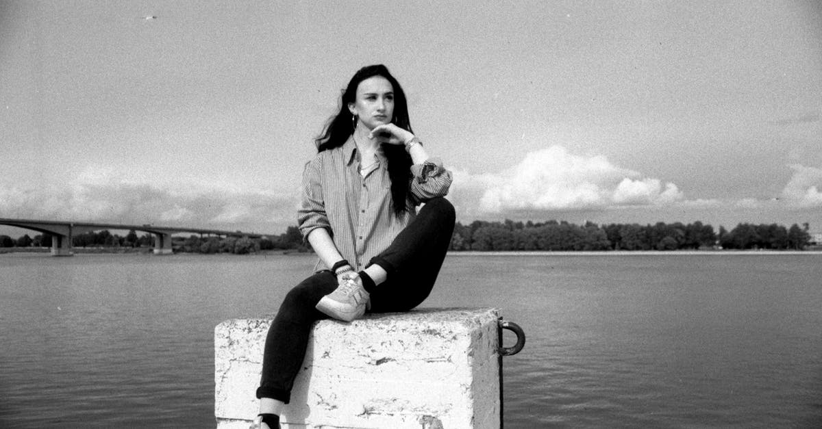 Do Mystery Blocks that turn into Ice Blocks immediately cause you to slide? - Woman in Black Dress Shirt and Black Pants Sitting on Concrete Bench Do Mystery Blocks that turn into Ice Blocks immediately cause you to slide? - Woman in Black Dress Shirt and Black Pants Sitting on Concrete Bench