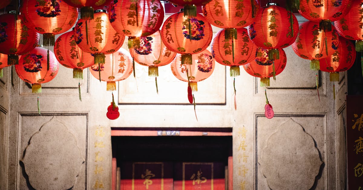 Do non-Kanto Pokemon evolve before getting the National Dex in a randomised Fire Red? - Traditional Chinese lanterns hanging in local historic
