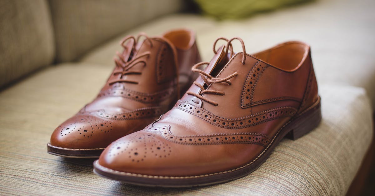 Do objects need to remain in the room to provide their trend bonuses? - Elegant brown pair of leather shoes for men placed on gray surface at home