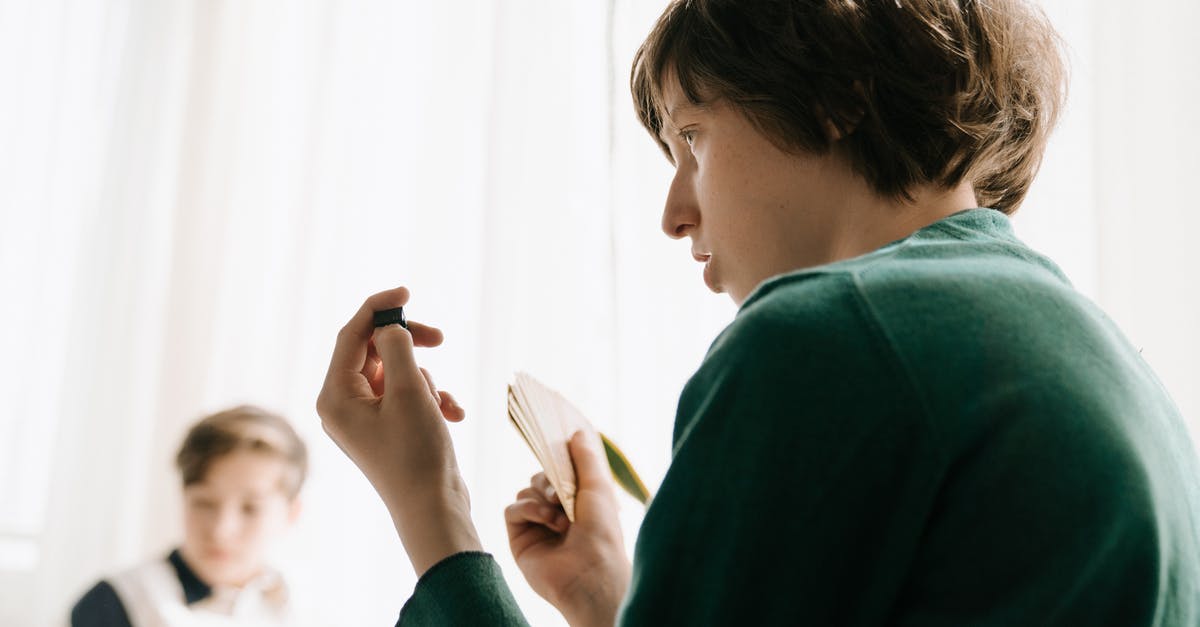 Do players get better by being played with the same profile? - Woman in Green Sweater Holding Smartphone Do players get better by being played with the same profile? - Woman in Green Sweater Holding Smartphone