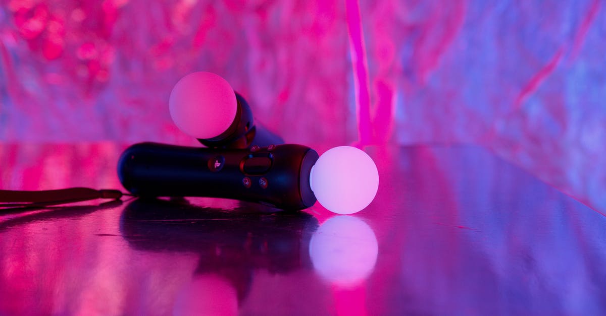 Do PlayStation 2 controllers support USB connections? - Close-up Photo of PlayStation Controllers Do PlayStation 2 controllers support USB connections? - Close-up Photo of PlayStation Controllers