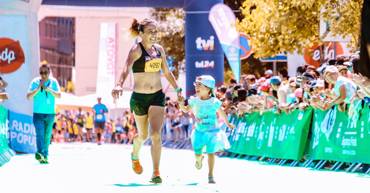 Do races affect stats? - Photo of Woman Running Beside Her Child
