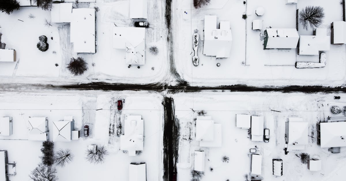 Do roads count as improvements for Weather Controller Sats? - Aerial Photo of Houses Covered with Snow