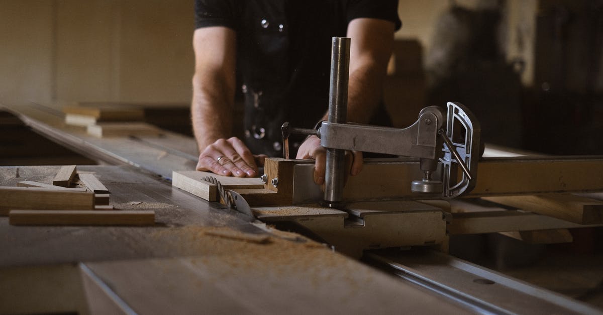 Do Sharpness and Smite enchantments stack damage? - Anonymous male woodworker in apron standing at sawbench while working with wooden details in professional carpentry with stack of wood Do Sharpness and Smite enchantments stack damage? - Anonymous male woodworker in apron standing at sawbench while working with wooden details in professional carpentry with stack of wood