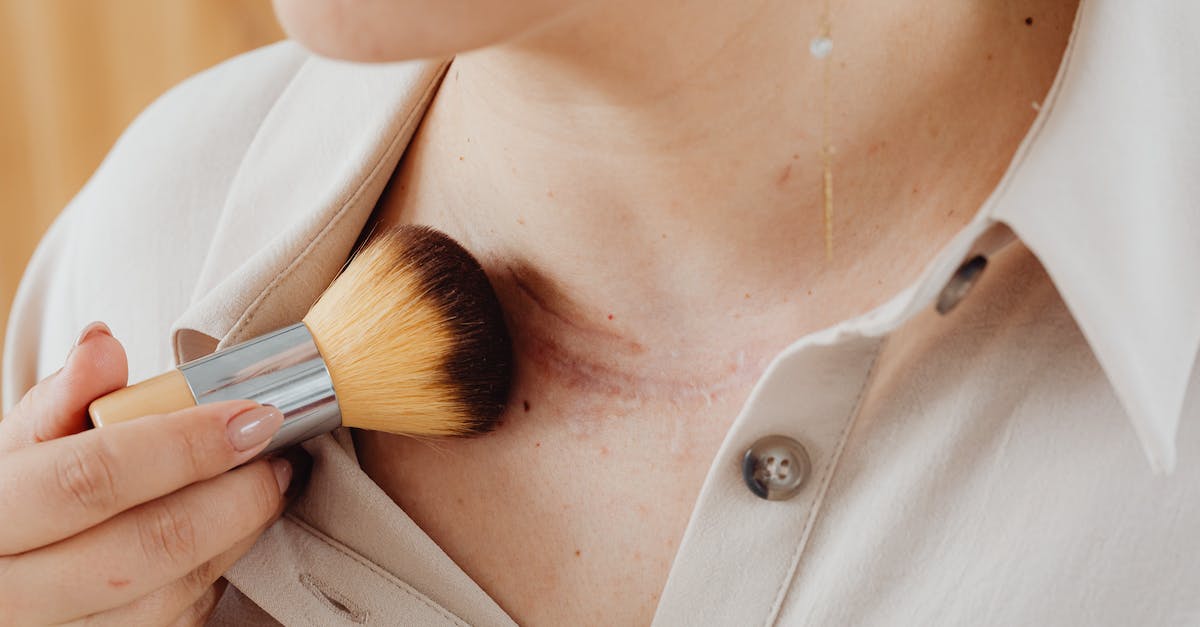 Do skin makers with lower-rarity skins get more money? - Woman in White Collared Shirt With Brown and Silver Makeup Brush