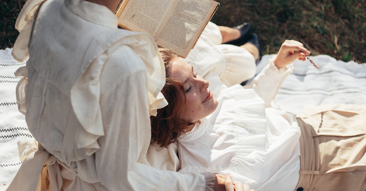 Do spells persist past transmigration? [duplicate] - Women in Old-Fashioned Clothing on Picnic Blanket in Park