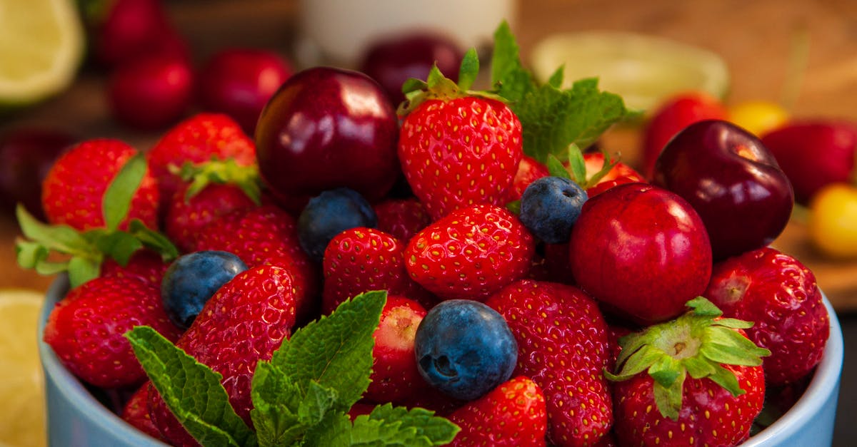 Do strawberries in Celeste Classic (Pico-8) count toward the level strawberries? - Strawberries on White Ceramic Bowl