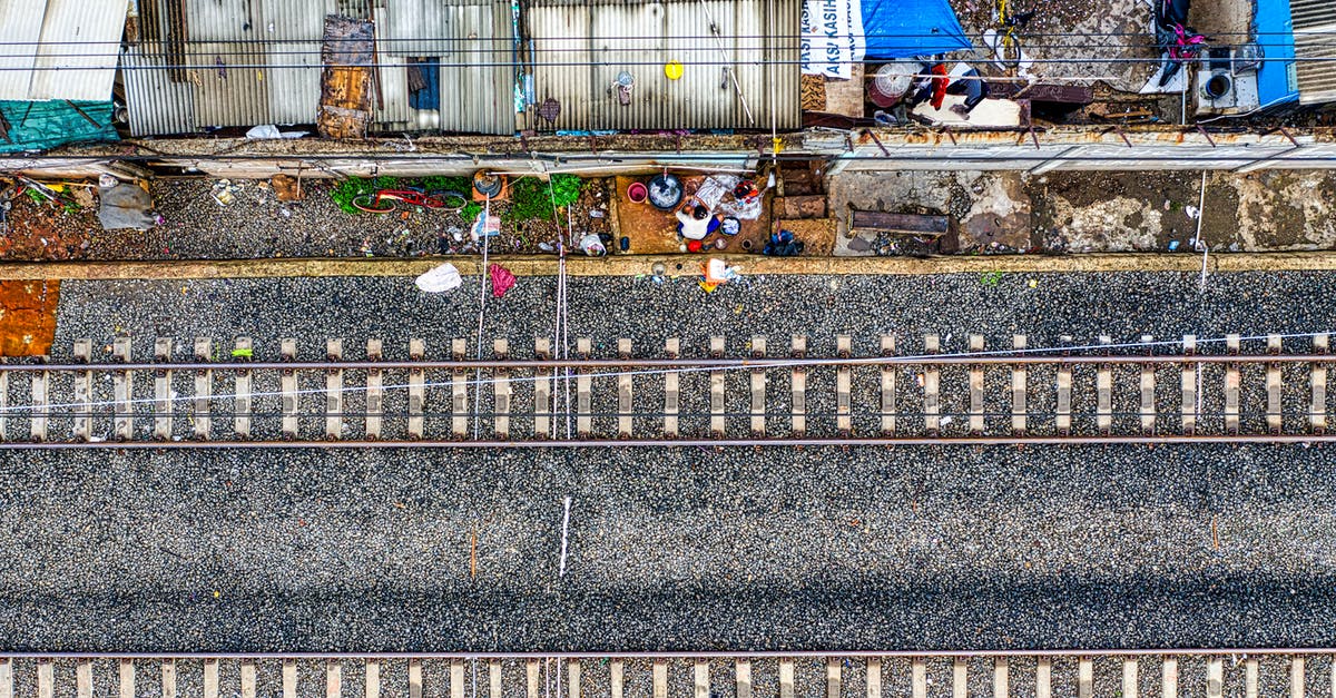 Do the Double Shot and Bloonjtsu upgrades pierce more bloons? - An Aerial View of a Double Train Tracks on Gray Road Near Houses Do the Double Shot and Bloonjtsu upgrades pierce more bloons? - An Aerial View of a Double Train Tracks on Gray Road Near Houses
