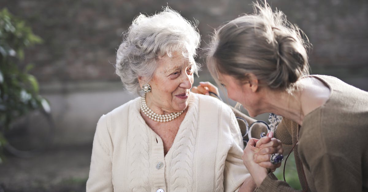 Do the elders appear in a predetermined order? - Two Adult Women Beside Each Other