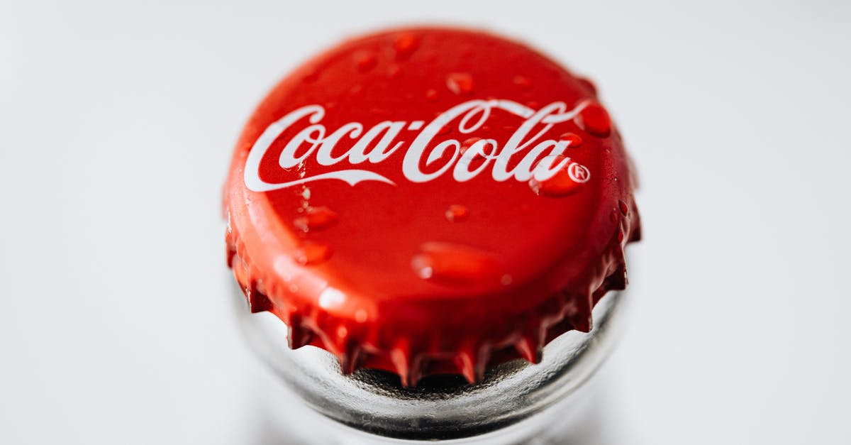 Do the same powerups in Splatoon-gear stack? [duplicate] - Closeup of red metal bottle cap placed on glass bottle with water droplets on white background