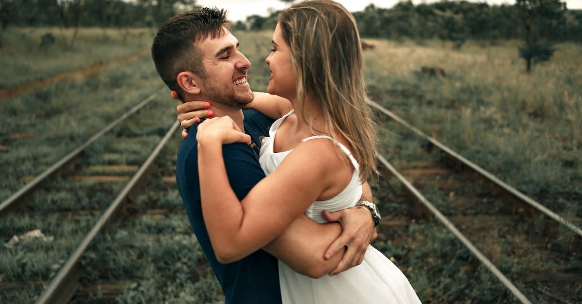 Do Tracking Disruptors Affect Missiles? - Woman Wearing White Sleeveless Dress Beside Man Wearing Blue Shirt