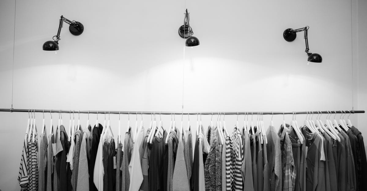 Do trees drop furniture in all colors and varieties or only the types sold in the shop in ACNH? - Grayscale Photography of Assorted Shirts Hanged on Clothes Rack