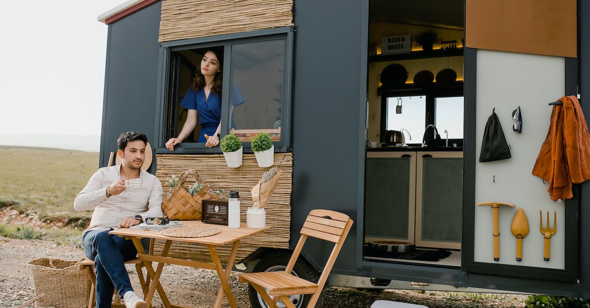 Do we have quests in Witcher 3 with a time limit? - Young Couple Spending Leisure Time in Mobile Home