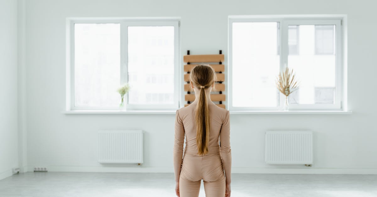 Do windows have a downside? - Woman in Brown Long Sleeve Shirt and Gray Pants Standing on White Floor Do windows have a downside? - Woman in Brown Long Sleeve Shirt and Gray Pants Standing on White Floor