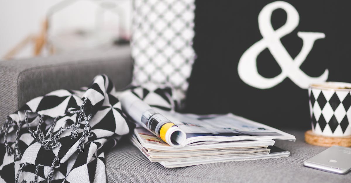 Do Xbox Live subscriptions stack duration? [duplicate] - Close of magazines, mug and phone on a couch
