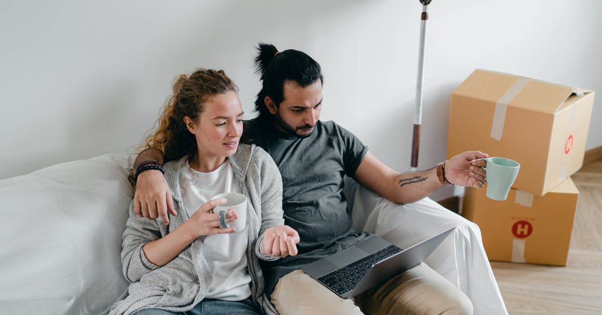 Do you need to scan the 30th anniversary mario amiibo everytime to use the extra stuff - Bonding couple browsing laptop after packing carton boxes Do you need to scan the 30th anniversary mario amiibo everytime to use the extra stuff - Bonding couple browsing laptop after packing carton boxes