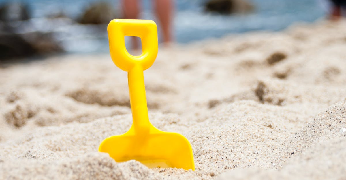Does 1 Unbreaking II shovel last longer than 2 Unbreaking I shovels? - Yellow Shovel Half Buried on Sand Near the Ocean Does 1 Unbreaking II shovel last longer than 2 Unbreaking I shovels? - Yellow Shovel Half Buried on Sand Near the Ocean