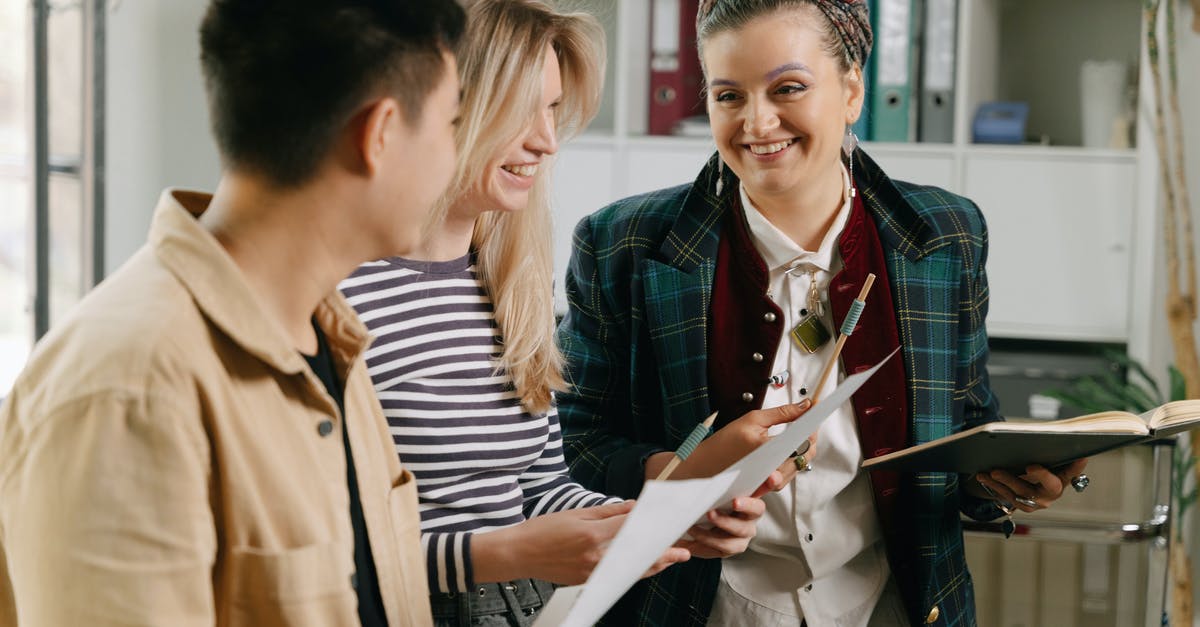 Does a Bowser Amiibo work in Super Smash Bros? - Woman in Brown Coat Holding White Paper