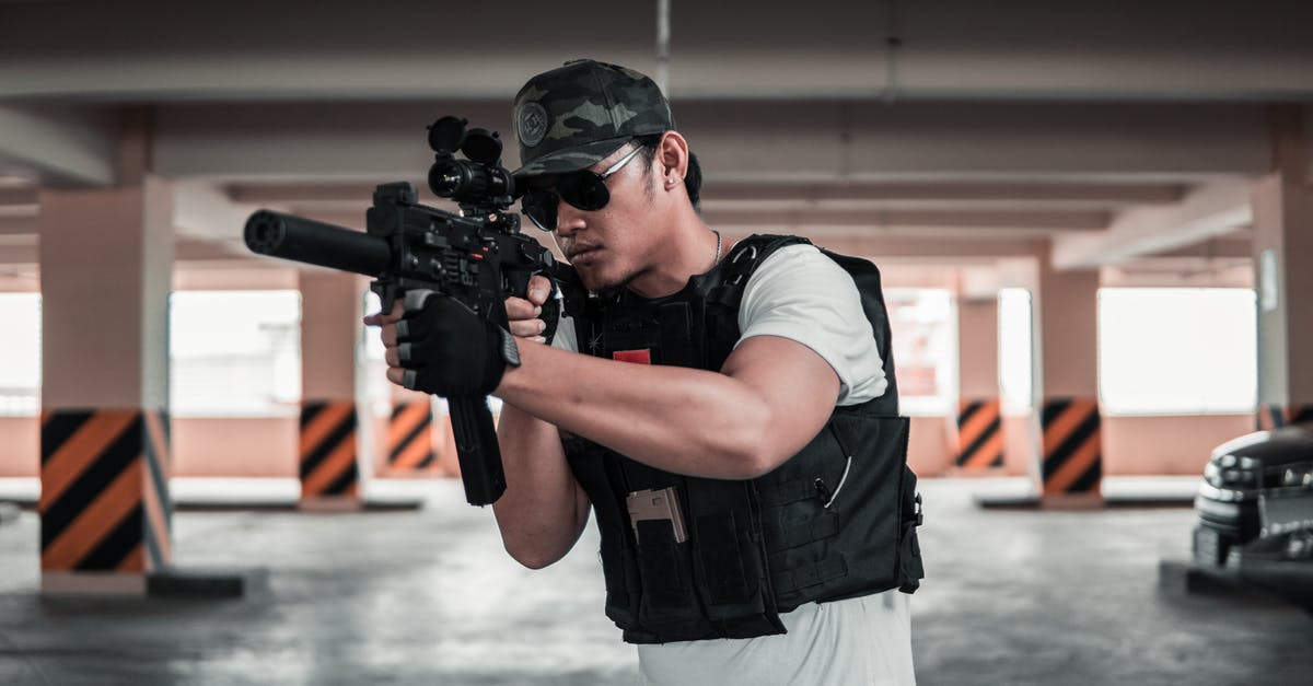 Does a Hazmat Vest make your soldier immune to Chryssalid poison? - Man in White T-shirt and Vest Holding A Rifle Does a Hazmat Vest make your soldier immune to Chryssalid poison? - Man in White T-shirt and Vest Holding A Rifle