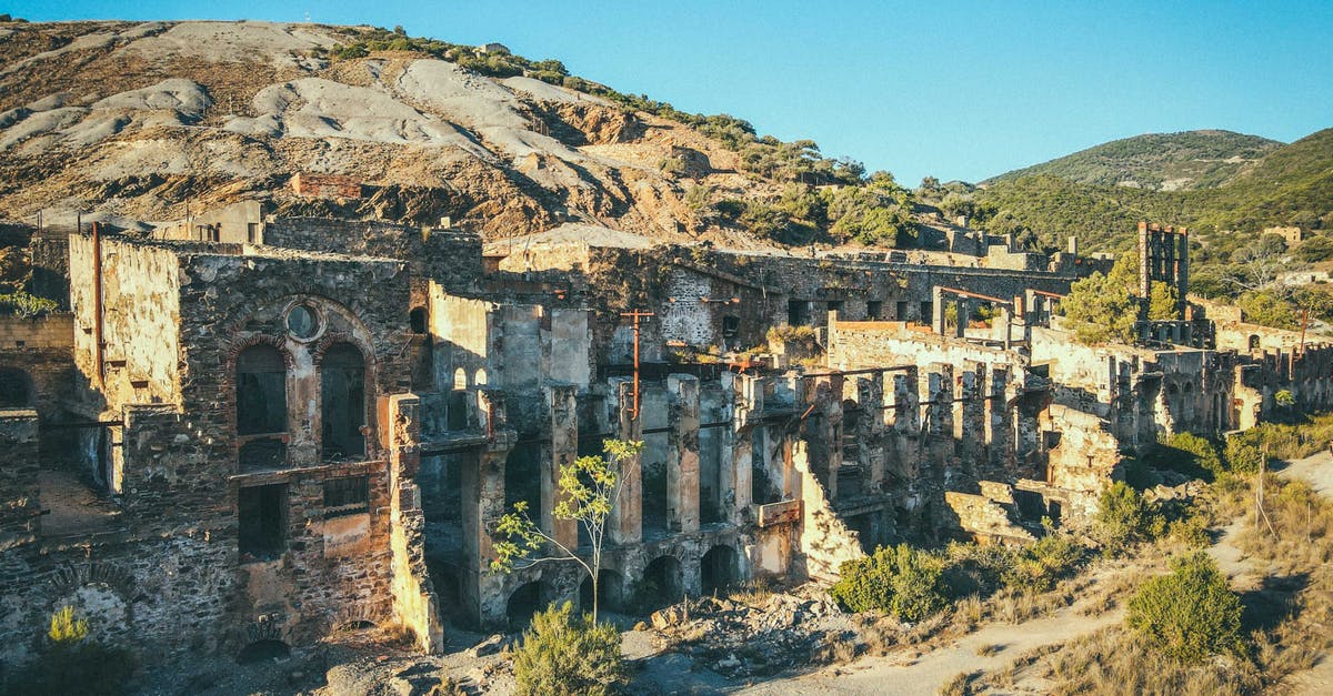 Does a Mining World designation improve strategic resource synthesis? - Ancient fort in mining site in mountainous terrain