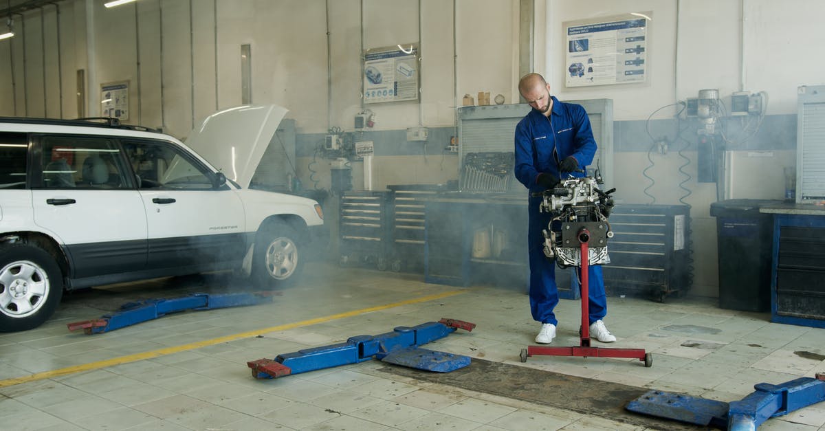Does Adding To Steam Auto-Update - Man in Blue Overall Fixing Engine