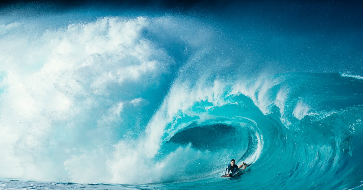 Does an enemy unit that is being damaged move at slower speed? - Scenery of male surfer lying on surfboard and riding turquoise foamy sea waves on sunny day