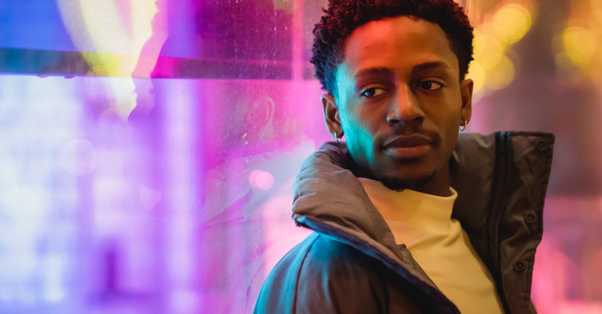 Does an individual's profiler output have any effect on gameplay? - Black man leaning on window glowing with neon light