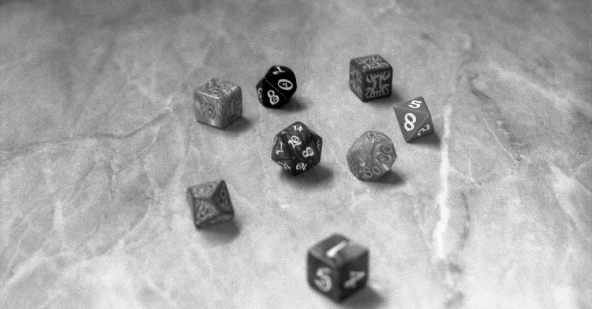 Does anyone have the formula for the damage multipliers in Tiny Dice Dungeon? - Black and White Dice on Counter