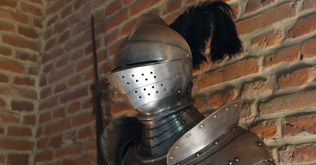 Does armor prevent injury? - Black Haired Woman Wearing Silver and Black Helmet Does armor prevent injury? - Black Haired Woman Wearing Silver and Black Helmet