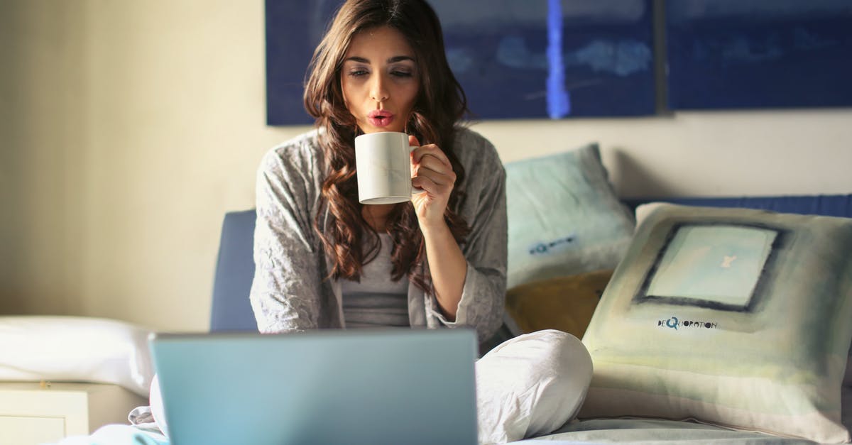 Does bed work after minecraft world corrupts - Woman in Grey Jacket Sits on Bed Uses Grey Laptop Does bed work after minecraft world corrupts - Woman in Grey Jacket Sits on Bed Uses Grey Laptop
