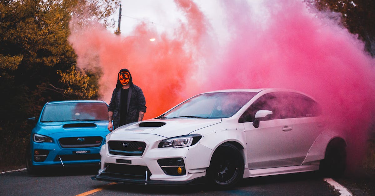 Does boosting have a greater effect within it own race? - Man in mask near sport cars behind smoke on road