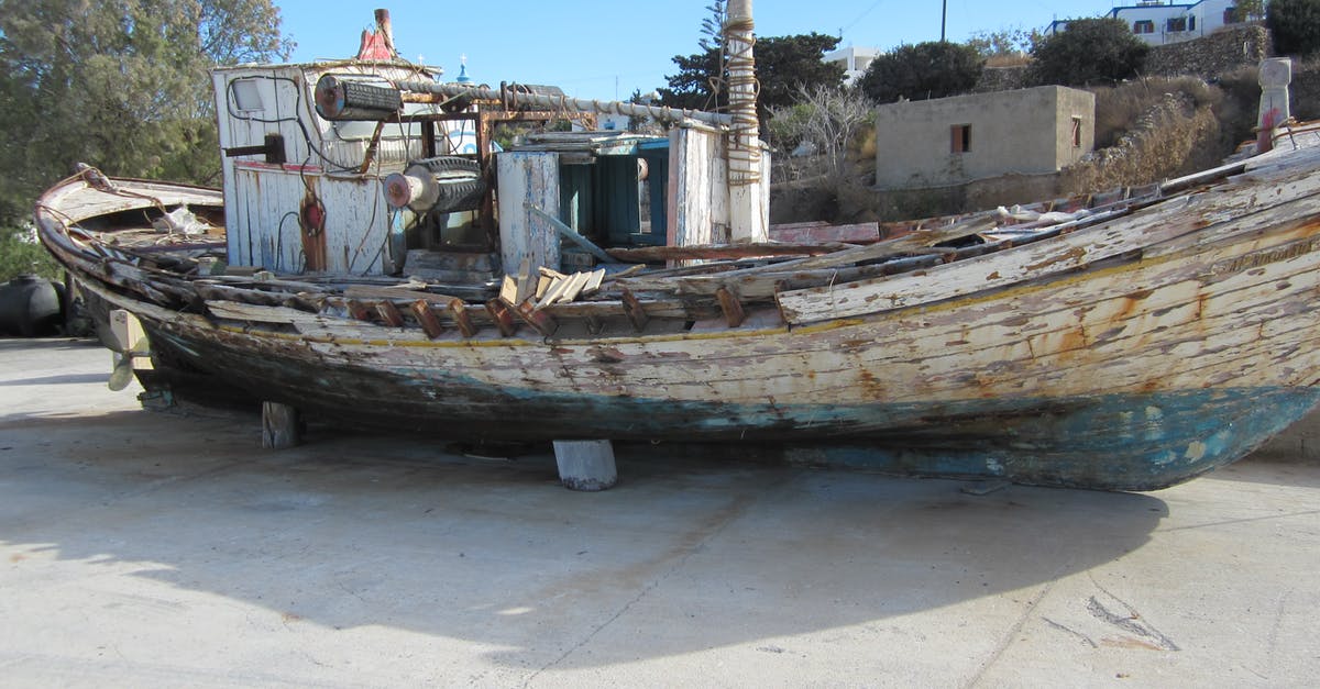 Does collecting an abandoned ship lose my old one? [duplicate] - White and Blue Wooden Boat