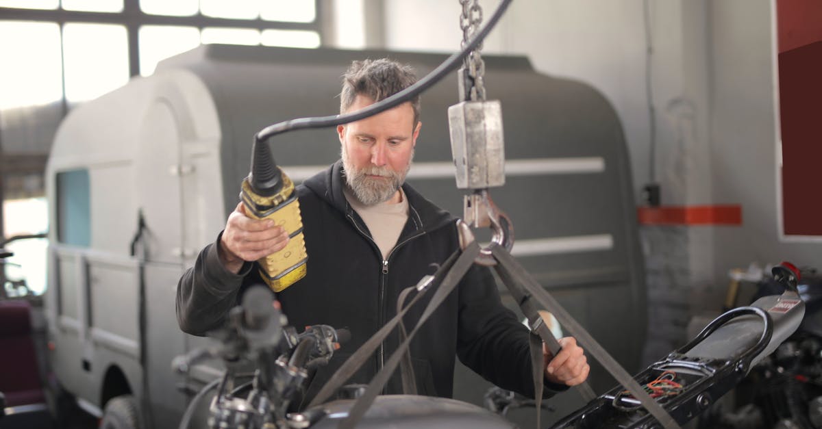 Does constantly powering on/off your ps4 wear down the system? - Male mechanic using hydraulic crane in garage Does constantly powering on/off your ps4 wear down the system? - Male mechanic using hydraulic crane in garage