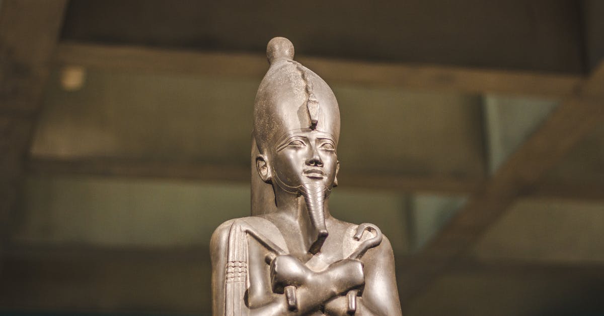Does destroying an artifact affect later artifact wishes? - Close-up Photo of Pharaoh Figurine