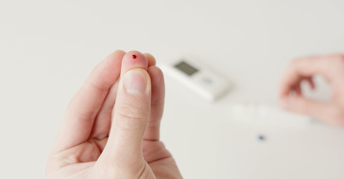 Does Dueling in Brotherhood of Blood affect K/D spread? - Person Holding Red Round Ornament