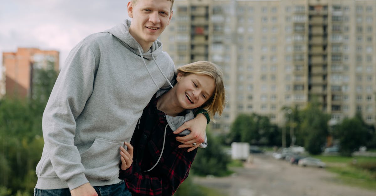 Does Dueling in Brotherhood of Blood affect K/D spread? - Young Man Posing with his Younger Brother 