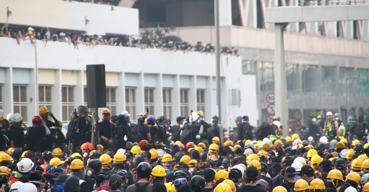 Does enabling gyro control in RE8 (still) disable the right stick? - Crowd of workers on mass meeting for rights