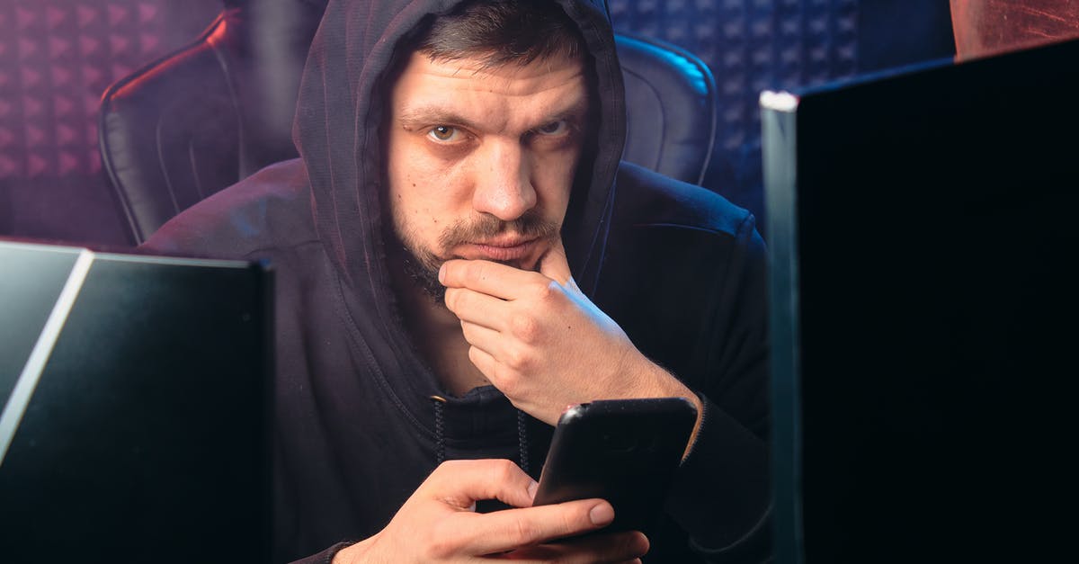 Does Encryption have an effect on the AI? - Man in Black Hoodie Holding Black Smartphone