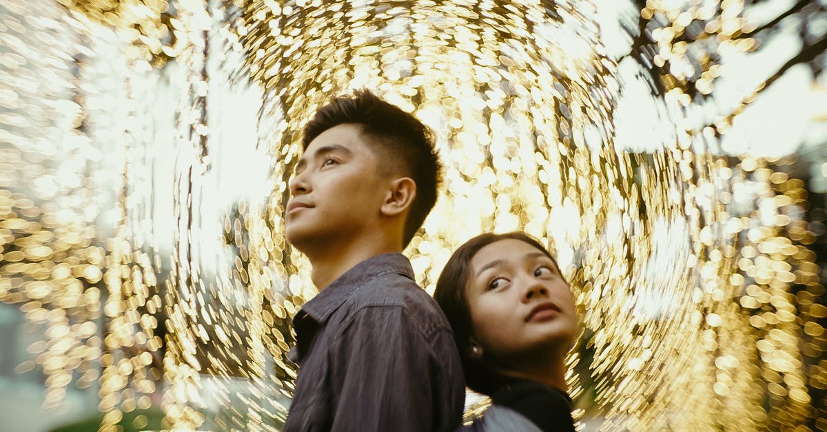 Does Encryption have an effect on the AI? - Woman in Black Coat Standing Beside Woman in Black Shirt