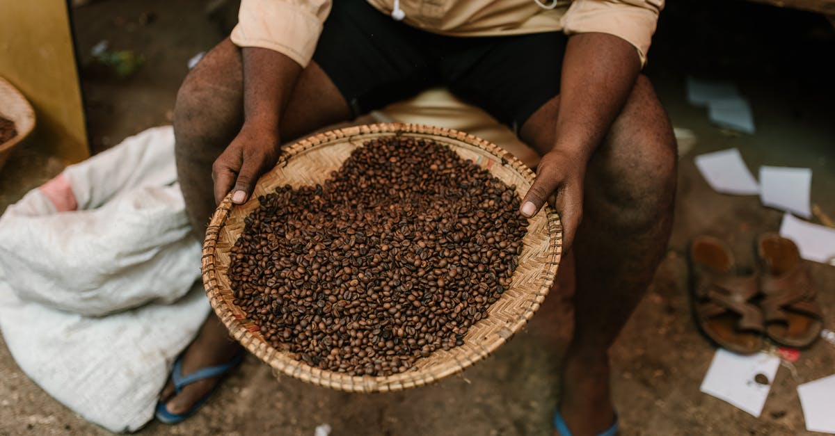 Does energy pulse stack per orb? - Crop ethnic person with coffee beans on plate Does energy pulse stack per orb? - Crop ethnic person with coffee beans on plate