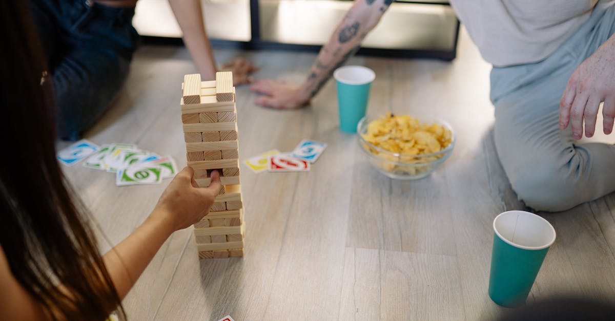 Does Engi Medi-bot dispersal heal the boarding party? - Person Holding Brown and White Wooden Blocks