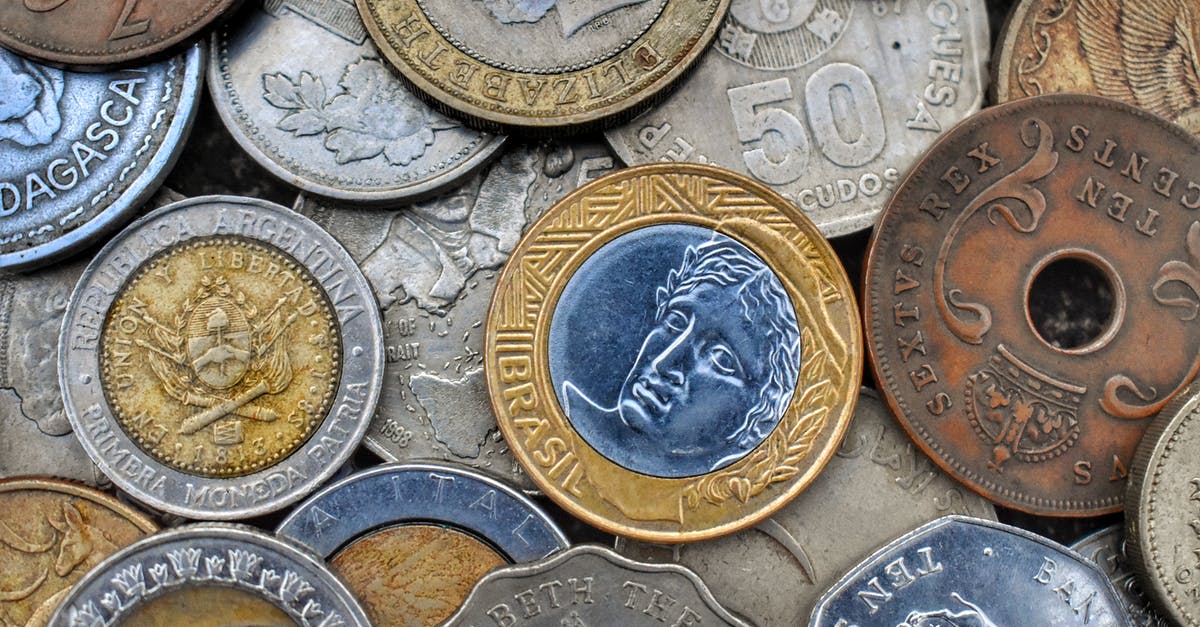 Does every trader set a different value per each item? - Top view of set of bright old metal coins with etchings and inscriptions with numbers Does every trader set a different value per each item? - Top view of set of bright old metal coins with etchings and inscriptions with numbers