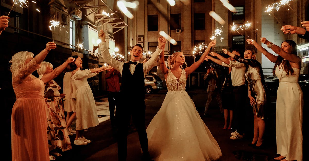 Does Felyne Temper affect arrows as did in classic games? - Cheerful young bride and groom with guests dancing on street with sparklers in hands during wedding party