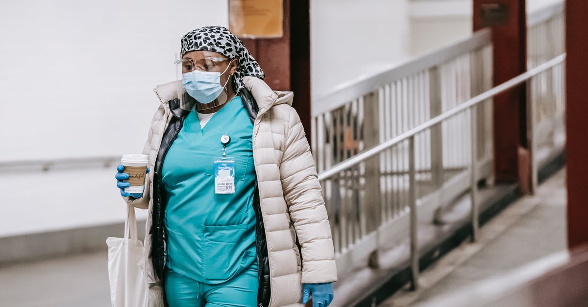 Does Gyrocopter's Rocket Barrage go through Stout Shield and armor? - Black female nurse in uniform and protective mask on street