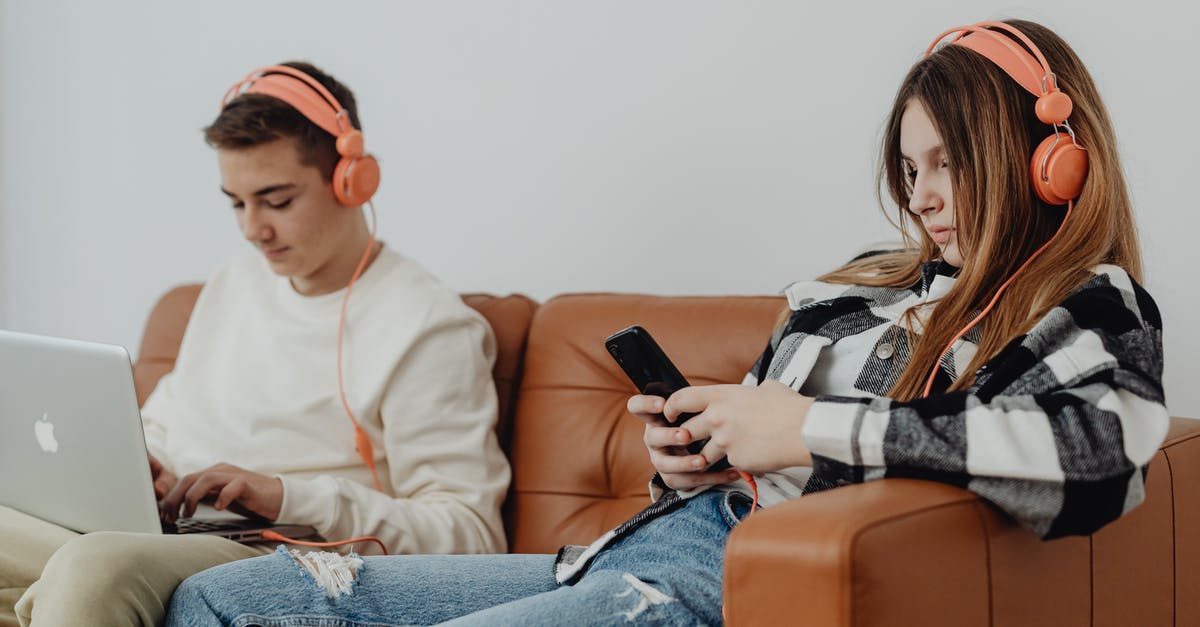 Does halo 4 Spartan ops require Internet to use? - Teenage Couple with Headphones on Using Modern Technology 