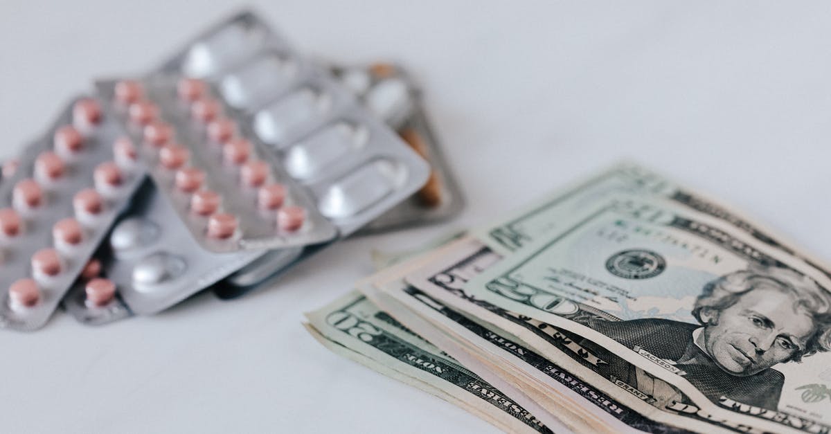 Does Hextech Gunblade heal passive stack with that of Will of the Ancients? - Pile of paper bills near set of multicolored pills